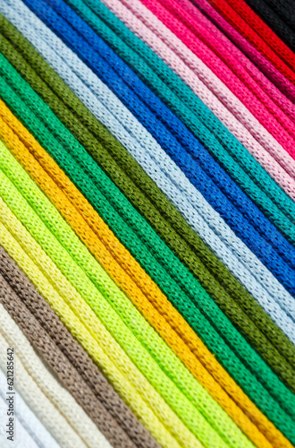 A bright palette of multi-colored, cotton threads for macrame. © Natalia
