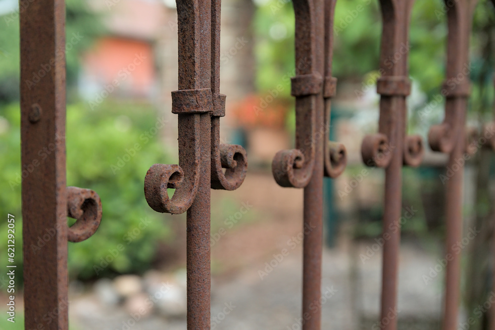 Retro metal fence decoration in the garden with bokeh background Retro metal fence decoration in the garden with bokeh background