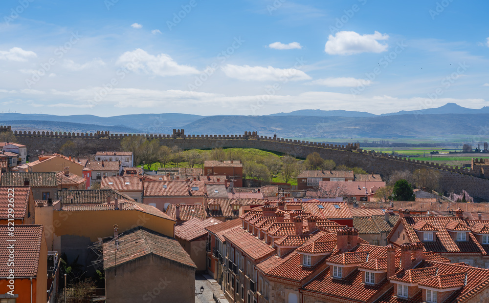 Aerial view of Avila with medieval walls and mountains - Avila, Spain