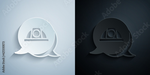 Paper cut Worker safety helmet icon isolated on grey and black background. Paper art style. Vector