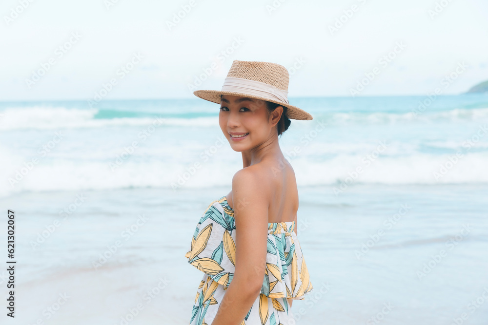 custom made wallpaper toronto digitalRadiating vacation vibes, a joyful woman soaks up the sun and sea, immersing herself in the carefree and rejuvenating spirit of beach travel.
