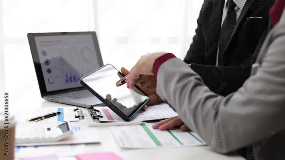 Financial adviser businessman discussing growing business chart for investment analysis and financial planning. Financial adviser businessman discussing growing business chart for investment analysis and financial planning.