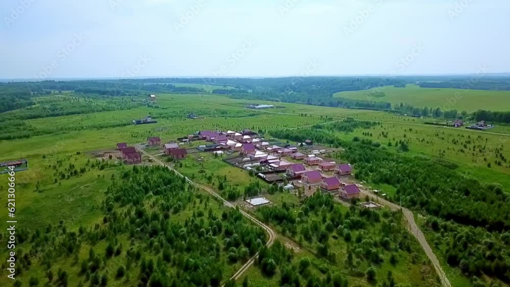 Houses in the village view from above green landscape Houses in the village view from above green landscape