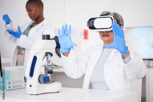 Scientist, woman and virtual reality, futuristic and science study with metaverse, medical research and investigation. Biotech, 3D and female doctor, digital world experience and VR goggles in lab