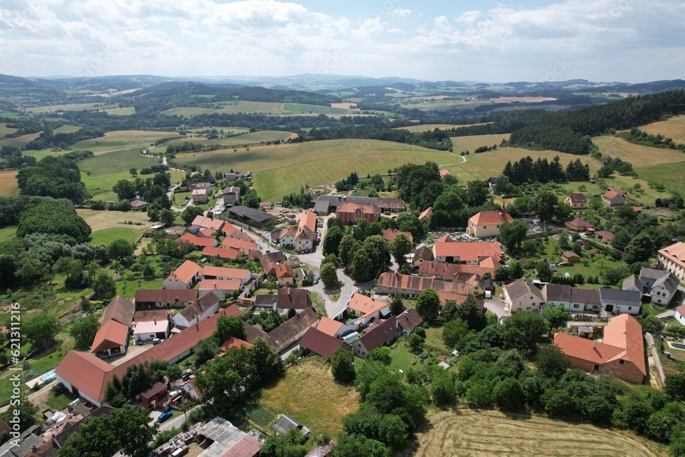 Fototapeta premium Hostice is a municipality and village in Strakonice District in the South Bohemian Region of the Czech Republic,czech village,aerial panorama landscape view