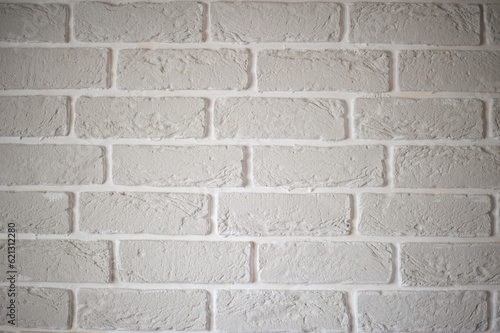 Decorative wall decoration with plaster bricks.