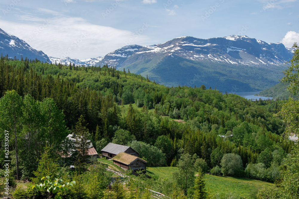 Landscape photo of farm in the mountains