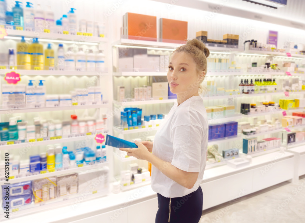 Woman buying make up at cosmetics section in store. choosing cosmetics, perfumes, creams and shampoos, Using tester. Woman buying make up at cosmetics section in store. choosing cosmetics, perfumes, creams and shampoos, Using tester.