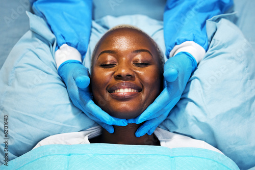 Beauty, smile and hands of surgeon on black woman face in clinic for plastic surgery, skincare or chemical peel. Medical, facial and female consulting dermatologist on anti aging, collagen or filler