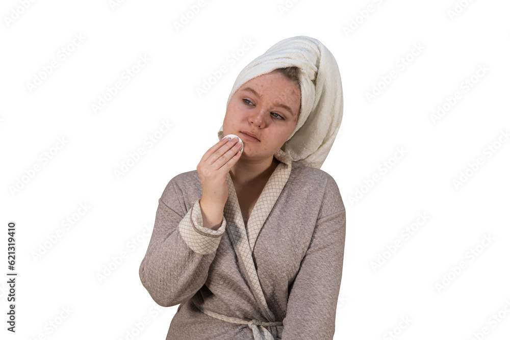 A girl in a bathrobe on a transparent background smears a rash on her face. Problem skin. Medicine, healthcare and home treatment concept A girl in a bathrobe on a transparent background smears a rash on her face. Problem skin. Medicine, healthcare and home treatment concept