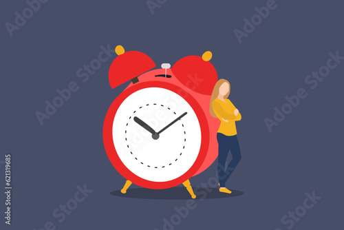 Business woman beside alarm clock. concept of relax and refresh from long stress interval, free from bored, and time to take a break
