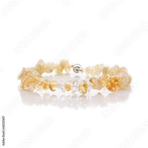 Obraz na płótnie Chips gemstone beaded bracelet. Energy crystals, healing stone jewelry. Handmade accessories. Birthstones. Mix of natural stones. Citrine. w salonie