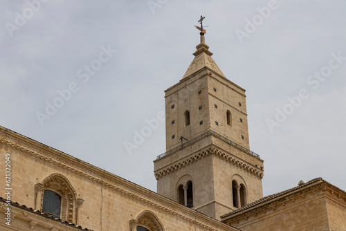 View of the city of Matera by day. Typical Salento illuminations during the holidays. Feast of the Brown Madonna  Matera. Prehistoric caves from the Murgia.Mysterious and ancient land among the stones