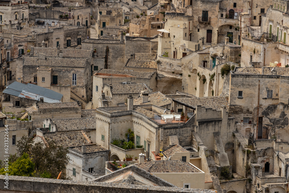 View of the city of Matera by day. Typical Salento illuminations during the holidays. Feast of the Brown Madonna, Matera. Prehistoric caves from the Murgia.Mysterious and ancient land among the stones