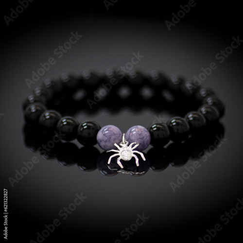 Obraz na płótnie Gemstone beaded bracelet. Energy crystals, healing stone jewelry. Handmade accessories.
Birthstone. Quartz, silver. w salonie