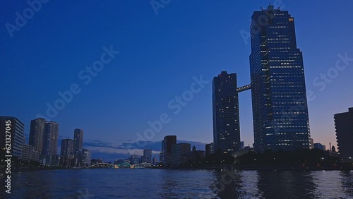 Night light Tokyo, Tsukuda, Toyosu skyscrapers and bridge the Sumida River Yakatabune, pleasure boat