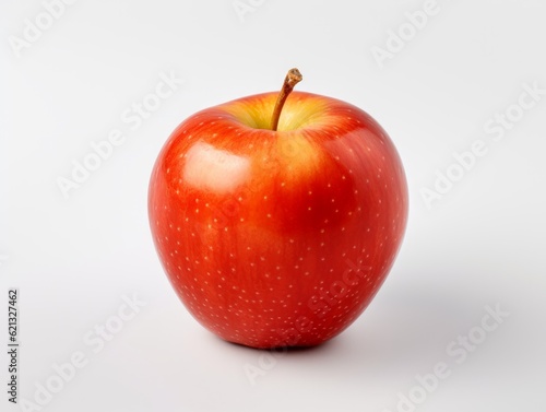 Red apple with green on white background