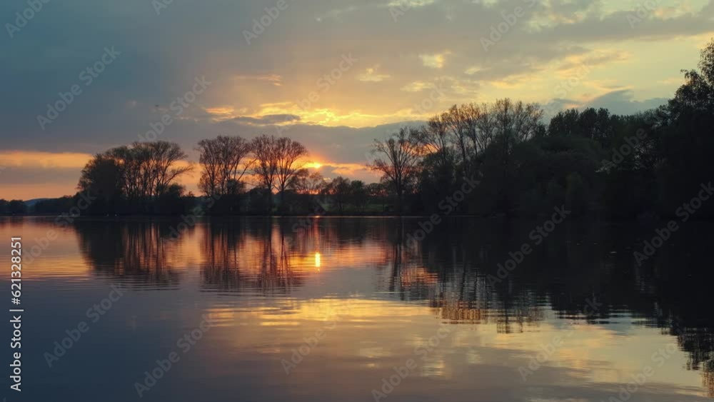 Beautiful panoramic sunset reflecting on small lake in Germany. Beautiful panoramic sunset reflecting on small lake in Germany.