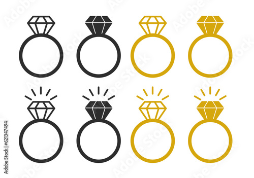 Wedding diamond ring jewelry vector icon set in black and gold color. Engagement or marriage ring symbol with crystal.