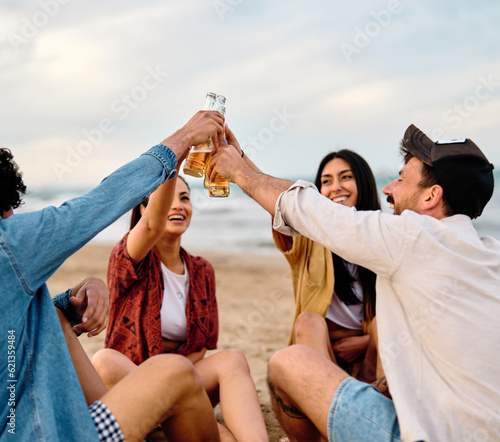 fun beach summer youth friend young friendship beer drink alcohol cheer happiness woman group beverage toast holiday bottle vacation sea © Lumos sp