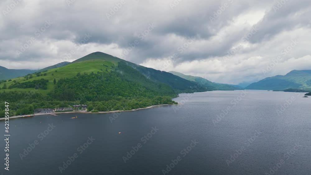Mountains and Lake around Luss Village from a drone, Loch Lomond, Argyll and Bute, Scotland, UK Mountains and Lake around Luss Village from a drone, Loch Lomond, Argyll and Bute, Scotland, UK