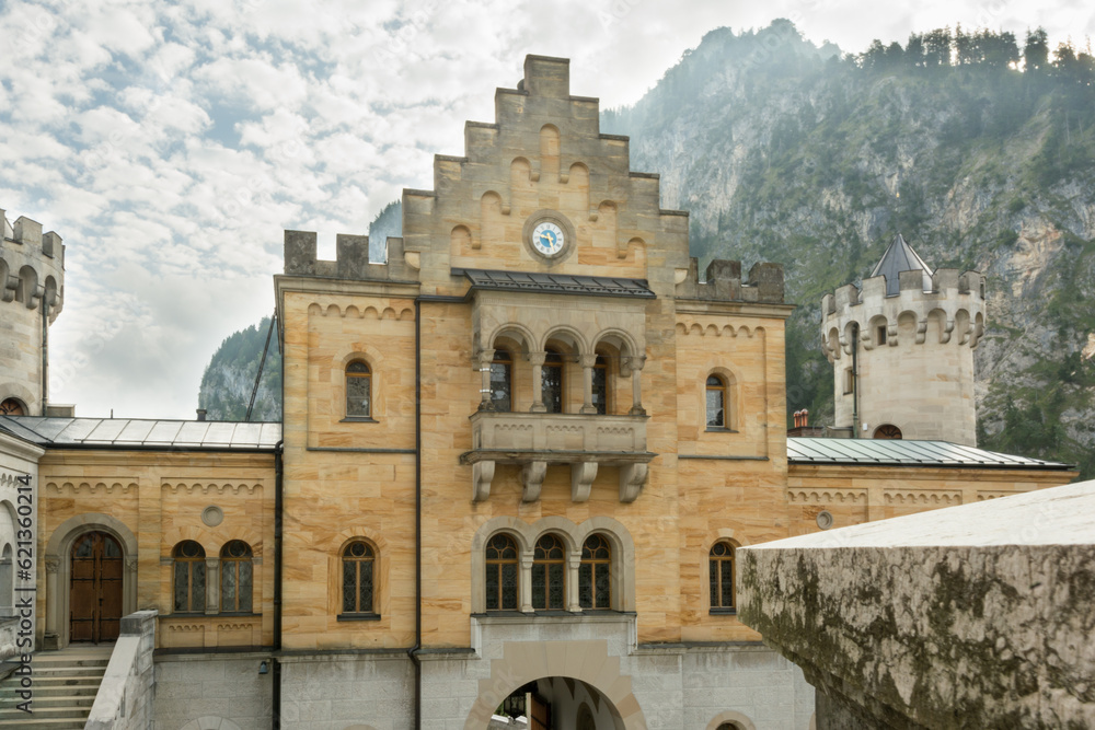 historic castle backed by rugged mountains