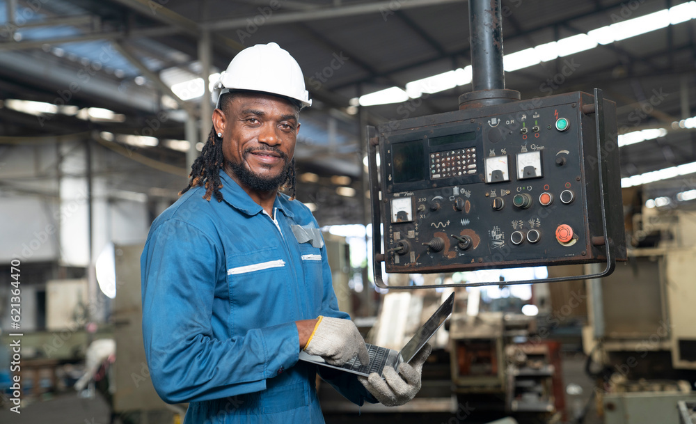 African engineer working at factory African engineer working at factory