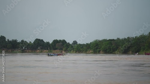 Traditional Dragon Boat Festival ( Pacu Perahu Naga ) of Batang Hari River Jambi, Sumatra, Indonesia photo