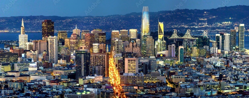 City of Lights: Panoramic View of San Francisco's Downtown Financial District in the Evening, Showcased in Stunning 4K Resolution