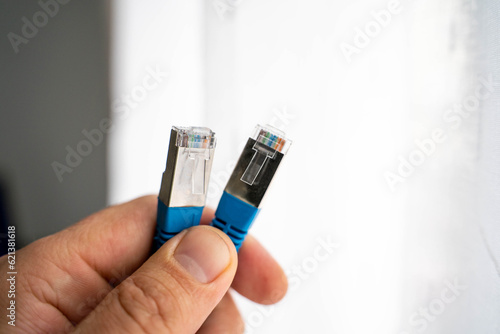 internet cable in male hand
