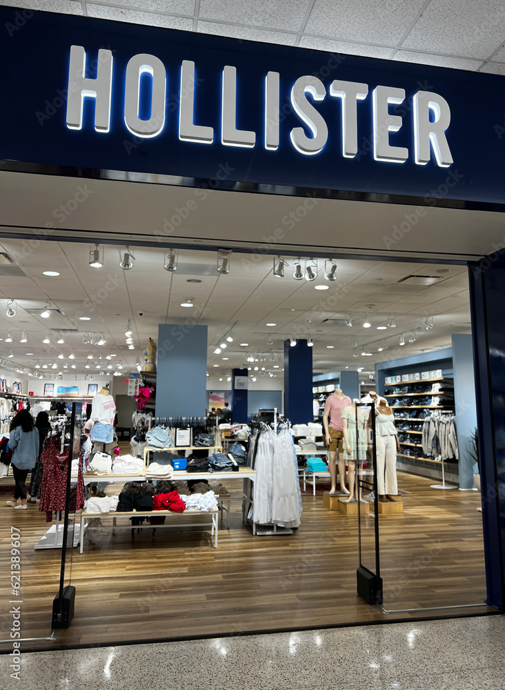Entrance of a Hollister retail store inside a shopping mall Stock Photo