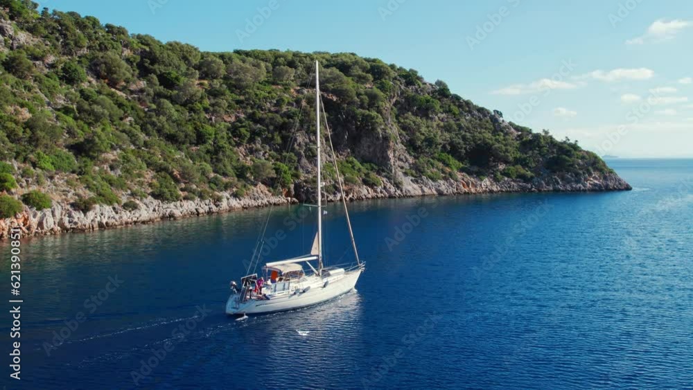 Sailboat near the coast of Kefalonia island, Ionian sea, Greece Sailboat near the coast of Kefalonia island, Ionian sea, Greece