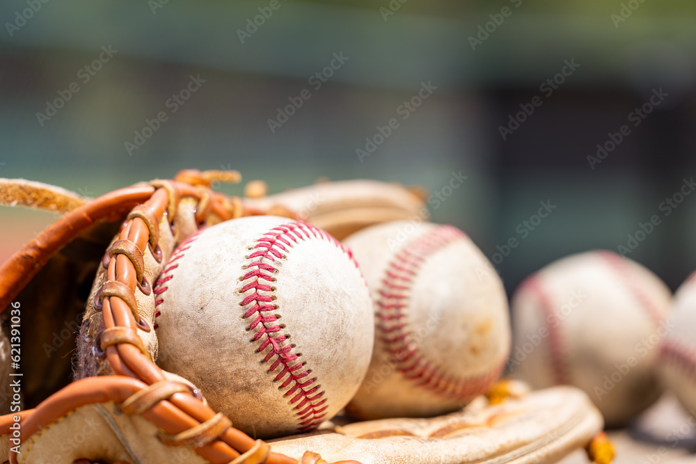 Used Baseballs in glove for sports background with copy space Used Baseballs in glove for sports background with copy space