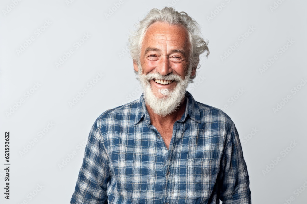 man in his 70s that is wearing a casual flannel shirt against a white background man in his 70s that is wearing a casual flannel shirt against a white background