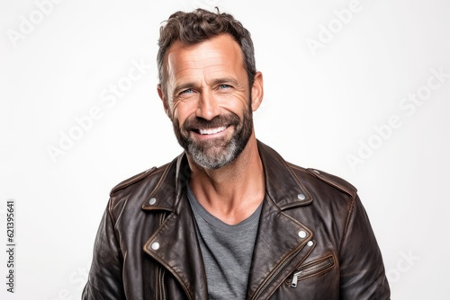 man in his 40s that is wearing a retro leather jacket against a white background