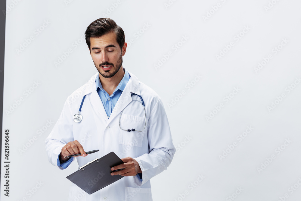 Man doctor in white coat with stethoscope and folder for notes and patient records smile and good test results on white isolated background, copy space, space for text, health Man doctor in white coat with stethoscope and folder for notes and patient records smile and good test results on white isolated background, copy space, space for text, health