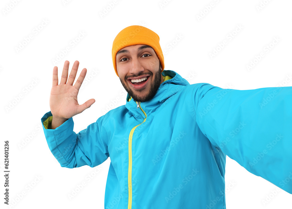 Smiling young man taking selfie on white background Smiling young man taking selfie on white background