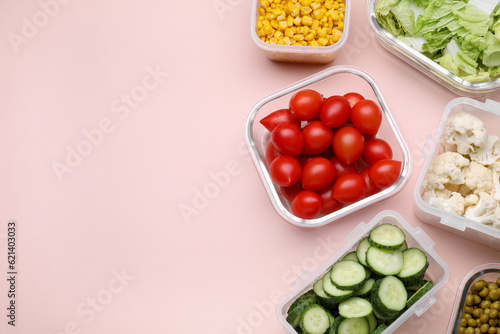 Plastic and glass containers with different fresh products on light pink background, flat lay. Space for text