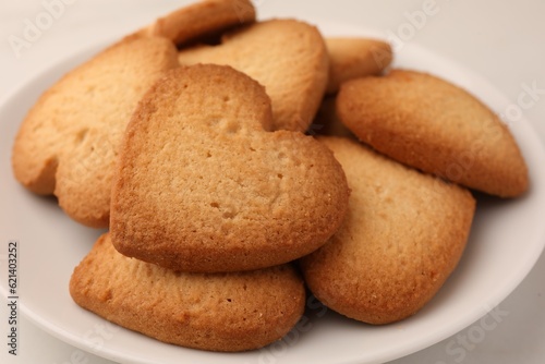 Heart shaped Danish butter cookies on plate, closeup