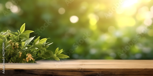 Empty wooden table top on blurred green nature garden background background. For product display montage © AspctStyle