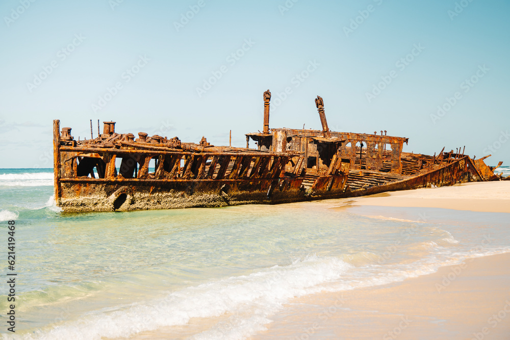 old rusty Shipwreck washed up on Fraser Island beach