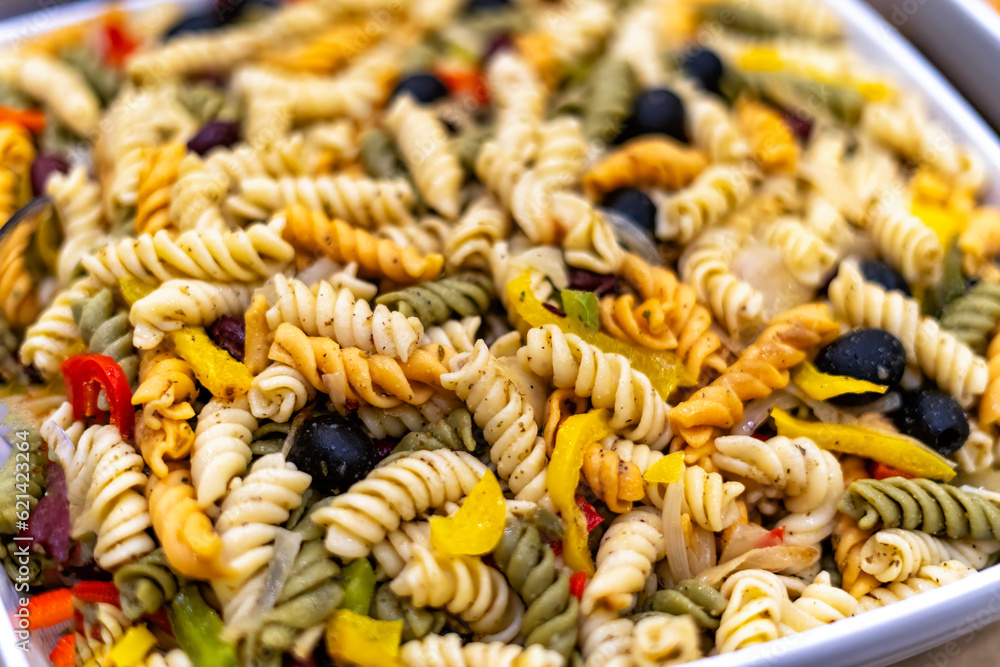 Colorful pasta salad bowl closeup