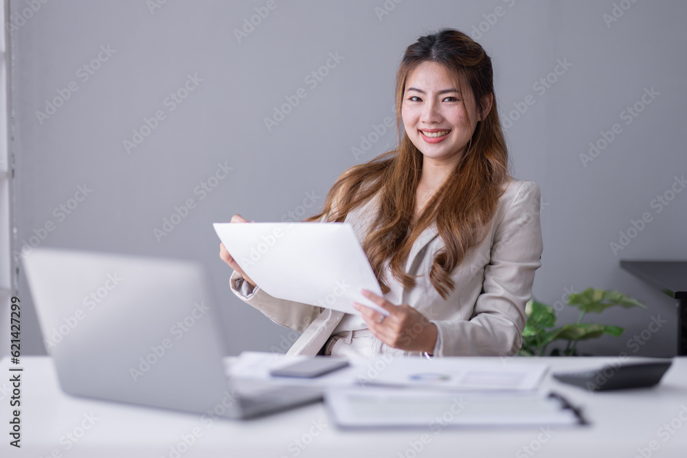 Business Documents, Auditor businesswoman checking searching document legal prepare paperwork or report for analysis TAX time, asian accountant Documents data contract partner deal in workplace office Business Documents, Auditor businesswoman checking searching document legal prepare paperwork or report for analysis TAX time, asian accountant Documents data contract partner deal in workplace office