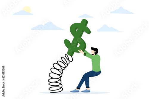 Stock market volatility and fluctuation concept, market swing by investor's greed and fear or investment risk, businessman investor trying to reach and pull dollar bound money sign with spring.