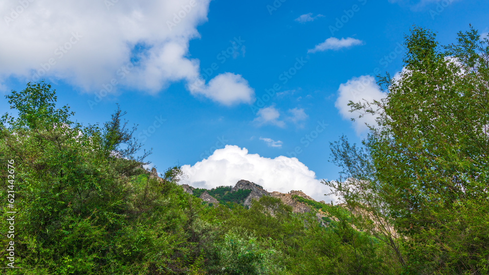 Beautiful thick clouds over rock in the blue sky Beautiful thick clouds over rock in the blue sky