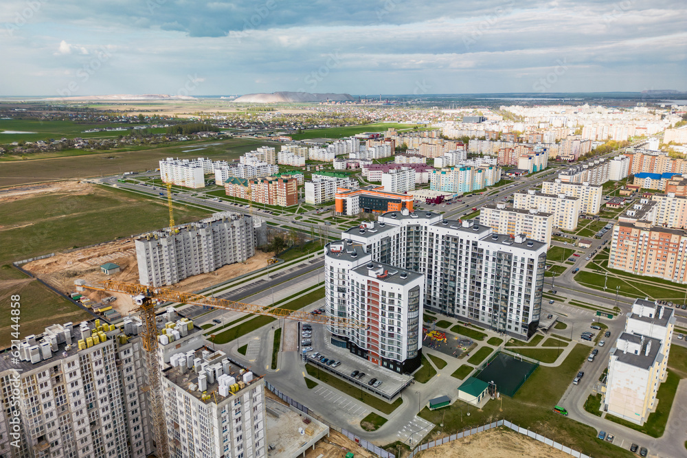 Cityscape of a residential area with modern apartment buildings, new green urban landscape in the city. Modern architectural building of the city. Mortgage.