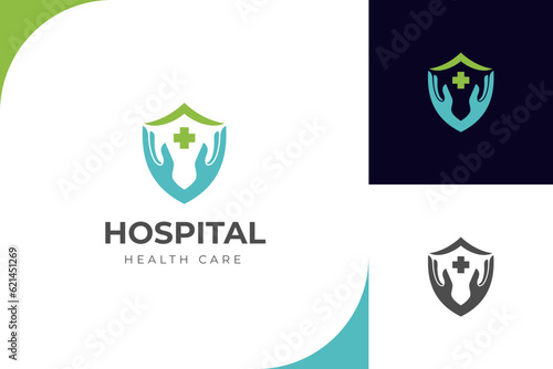 hospital logo design with shield and hand care icon symbol for pharmacy, medicine logo design