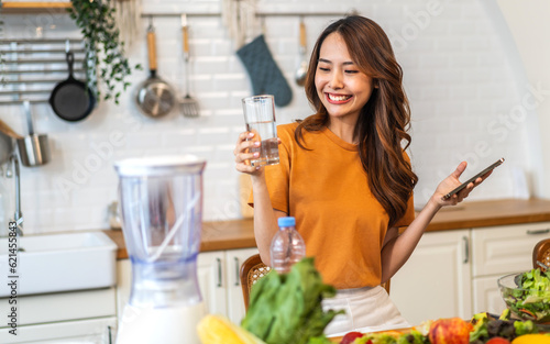 Portrait asian beauty body slim woman drinking water from a bottle while relax and feeling fresh, refresh drink, wellness, diet, healthcare, mineral at home.Healthy liquid lifestyle concept