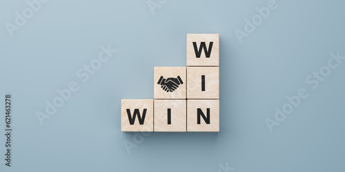 Konstfotografi Win win wording with hand shaking icon on wooden cube block
