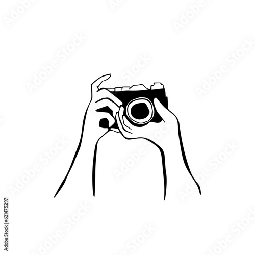 Sketch hands holding camera. Hand drawn doodle vector illustration.